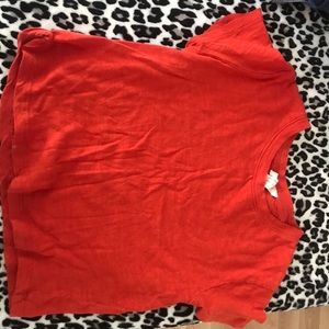 Bright orange crop top